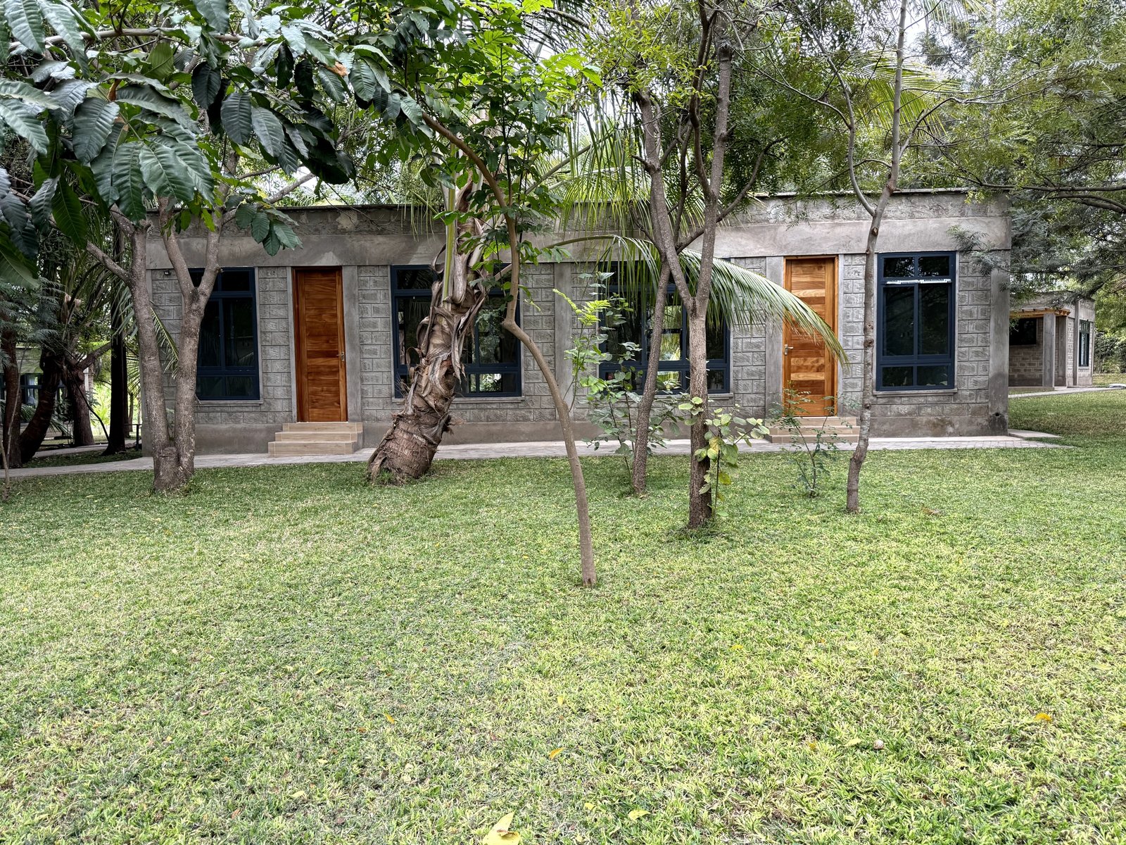 Nagira conference centre exterior among mature trees