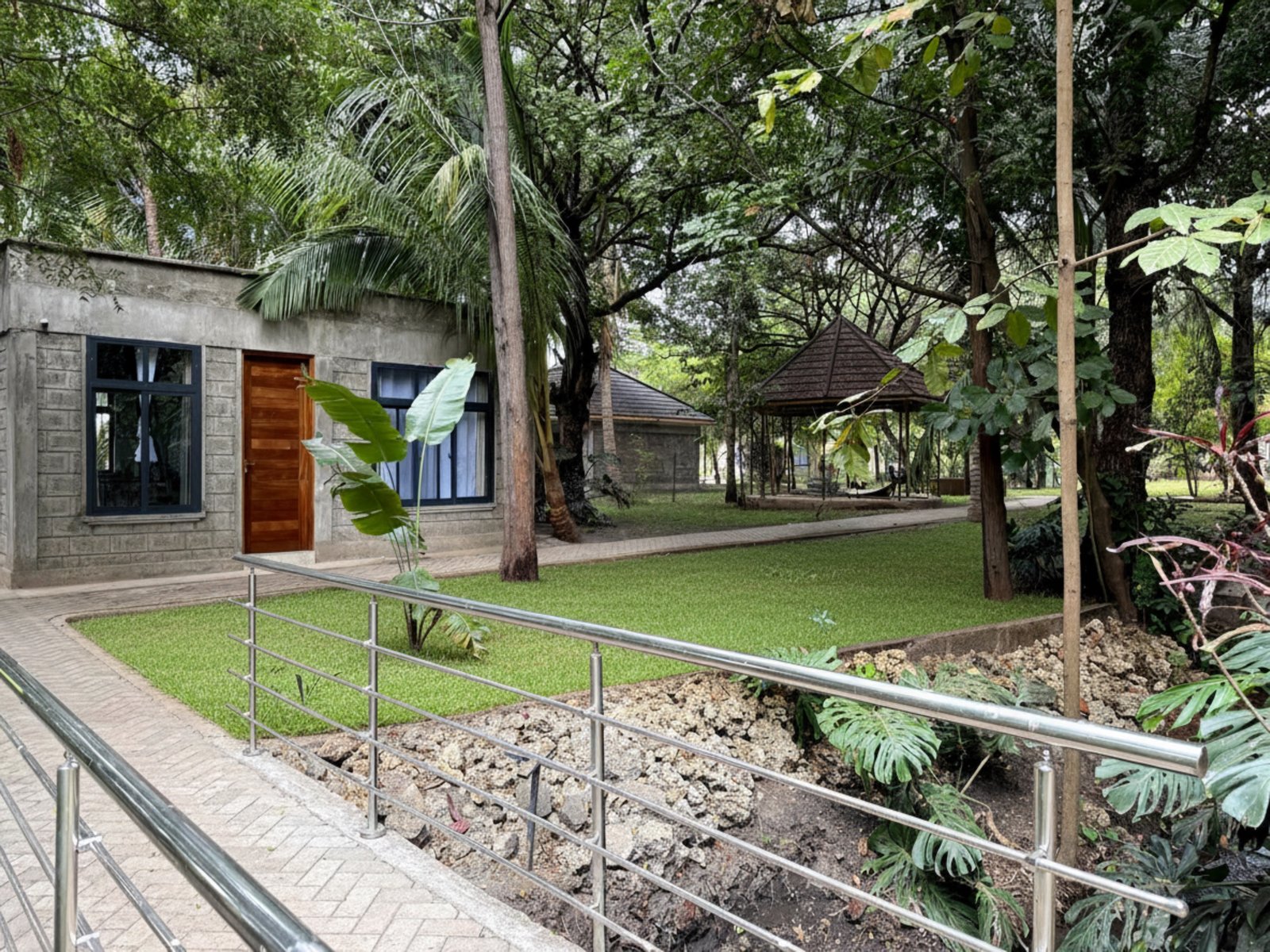 A quiet garden gazebo tucked beneath mature trees